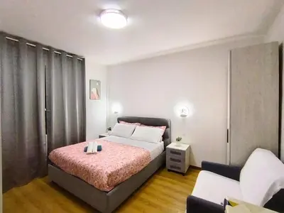 Letto o letti in una camera di Magnolia Boutique Luxury Rooms