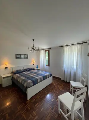 Letto o letti in una camera di Ai Due Ponti