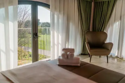 Letto o letti in una camera di Villa Luisa Francesca