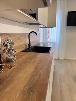 Cucina o angolo cottura di Golden House Apartsuite