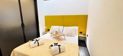 Letto o letti in una camera di Tema apartment by Ca-Sa Check