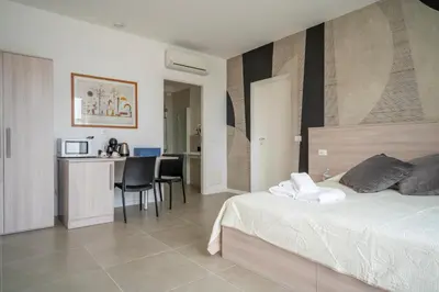 Letto o letti in una camera di Appia Rooms Free Parking 10 min to Venice Easy Access