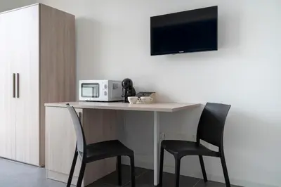 TV o dispositivi per l'intrattenimento presso Appia Rooms Free Parking 10 min to Venice Easy Access