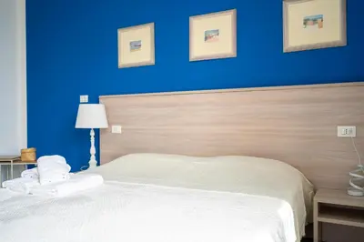 Letto o letti in una camera di Appia Rooms Free Parking 10 min to Venice Easy Access