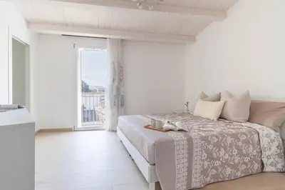 Letto o letti in una camera di San Francesco Harmony Home