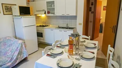 Cucina o angolo cottura di Appartamento Cavallino Treporti con Piscina