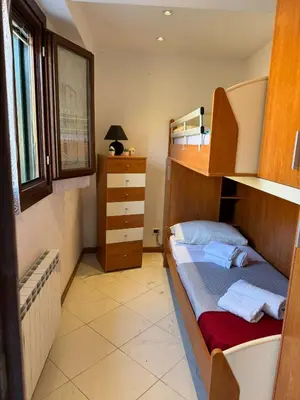 Letto o letti in una camera di Casa Michela