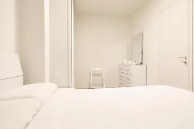 Letto o letti in una camera di Ca Borsa III - Suite nel cuore di Treviso