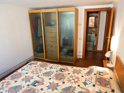 Letto o letti in una camera di Ca' Renzon