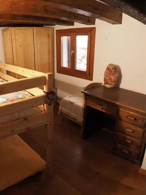 Letto o letti in una camera di Ca' Renzon