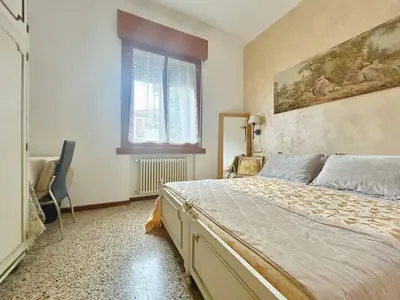 Letto o letti in una camera di Mosaico Apartment