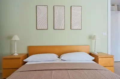Letto o letti in una camera di Leonardo Apartment - Venice