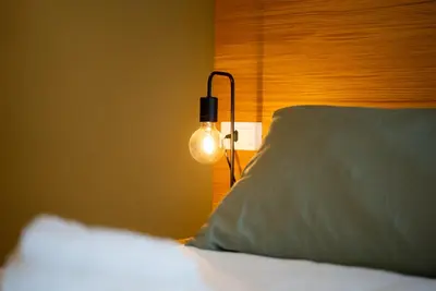 Letto o letti in una camera di Locanda 19 al paradiso