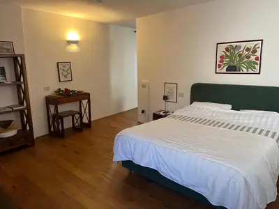 Letto o letti in una camera di Garibaldi Suite
