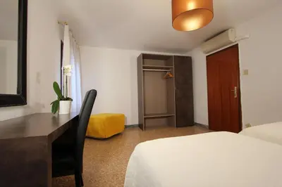 Letto o letti in una camera di Residence San Marco