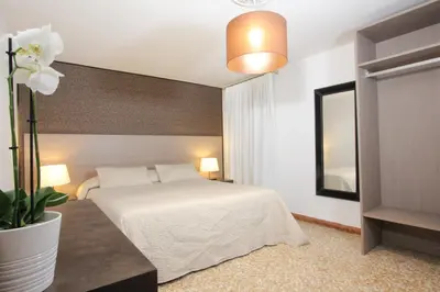 Letto o letti in una camera di Residence San Marco