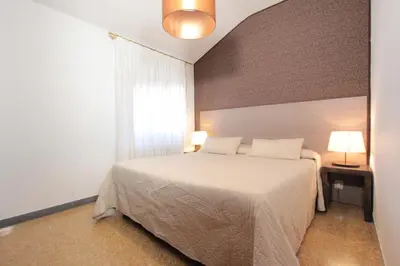 Letto o letti in una camera di Residence San Marco