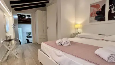 Letto o letti in una camera di Relax Terrace, Venice Historical Center
