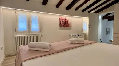 Letto o letti in una camera di Relax Terrace, Venice Historical Center
