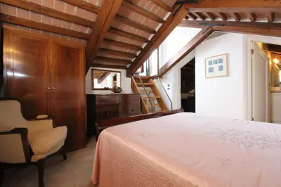 Letto o letti in una camera di Zoia Terrace view on St Marks Basilica 150mt
