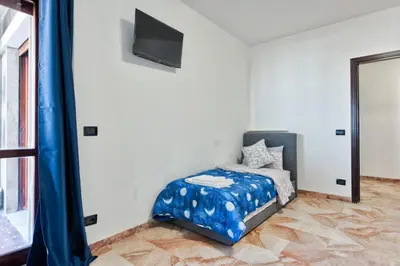 Letto o letti in una camera di Easy Downtown Inn
