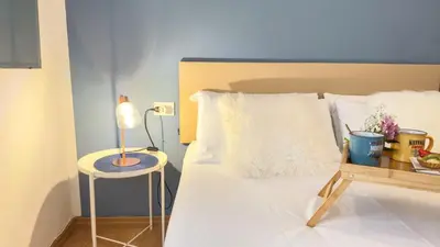 Letto o letti in una camera di L’Ultimo Venchero by Ca-Sa Check