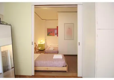 Letto o letti in una camera di CANAL-VIEW, Apartment in Venice