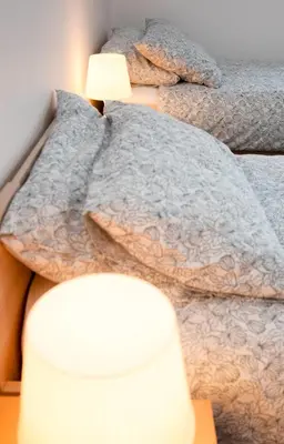 Letto o letti in una camera di Casa Patavina