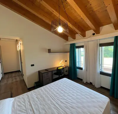 Letto o letti in una camera di Le Cesure