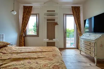 Letto o letti in una camera di Ap 2 Free Parking Romantic Garden Venice