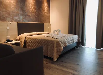 Letto o letti in una camera di Hotel ALDEBARAN & Restaurant