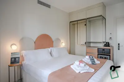 Letto o letti in una camera di Hotiday Venezia Cape