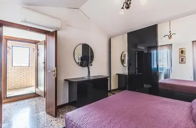 Letto o letti in una camera di Ca' Delfina Holiday Home