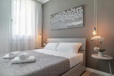 Letto o letti in una camera di Cima Suite 12 by WelcHome