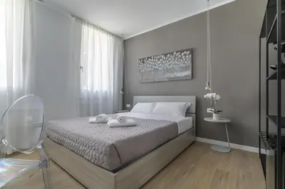 Letto o letti in una camera di Cima Suite 12 by WelcHome