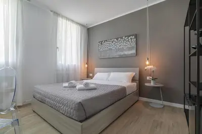 Letto o letti in una camera di Cima Suite 12 by WelcHome
