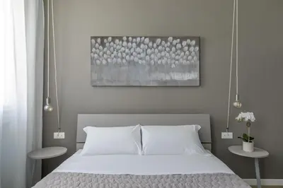 Letto o letti in una camera di Cima Suite 12 by WelcHome