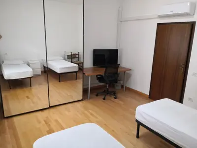 Letto o letti in una camera di Via Vecchia 66