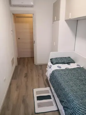 Letto o letti in una camera di Via Vecchia 66