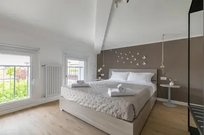 Letto o letti in una camera di Cima Suite 15 by WelcHome