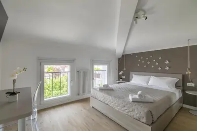 Letto o letti in una camera di Cima Suite 15 by WelcHome