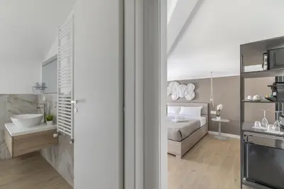 Letto o letti in una camera di Cima Suite 16 by WelcHome