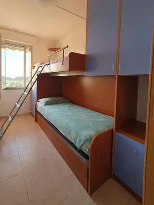 Letto o letti in una camera di Appartamento Isola Verde Chioggia