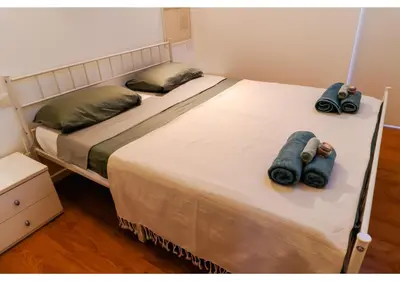 Letto o letti in una camera di Spiral-Loft, Santo Apartment