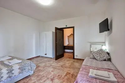Letto o letti in una camera di Arish Downtown Venice Apartment
