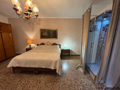 Letto o letti in una camera di Ritz Venice Guest House Lionsclass