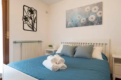 Letto o letti in una camera di EnJoy Home - La Quercia