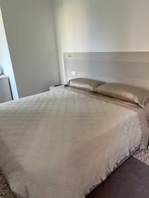 Letto o letti in una camera di Casa sulla Laguna CASTELLO