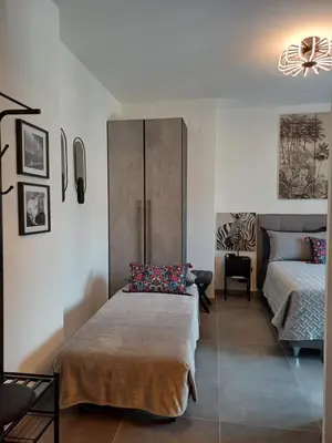 Letto o letti in una camera di Ferrari's Apartment