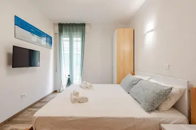 Letto o letti in una camera di Bright Summer Studio Pool-Parking -30m dal Mare